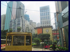 Tram passing through Causeway Bay, near the borders to Wan Chai. Causeway Bay is an urban area on the Northeast part of Hong Kong Island. It is part of both Wan Chai and Eastern districts. We only past the area by tram.